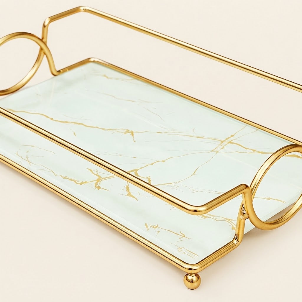 Gold vanity tray with marble-effect insert and rounded side handles, rectangular design