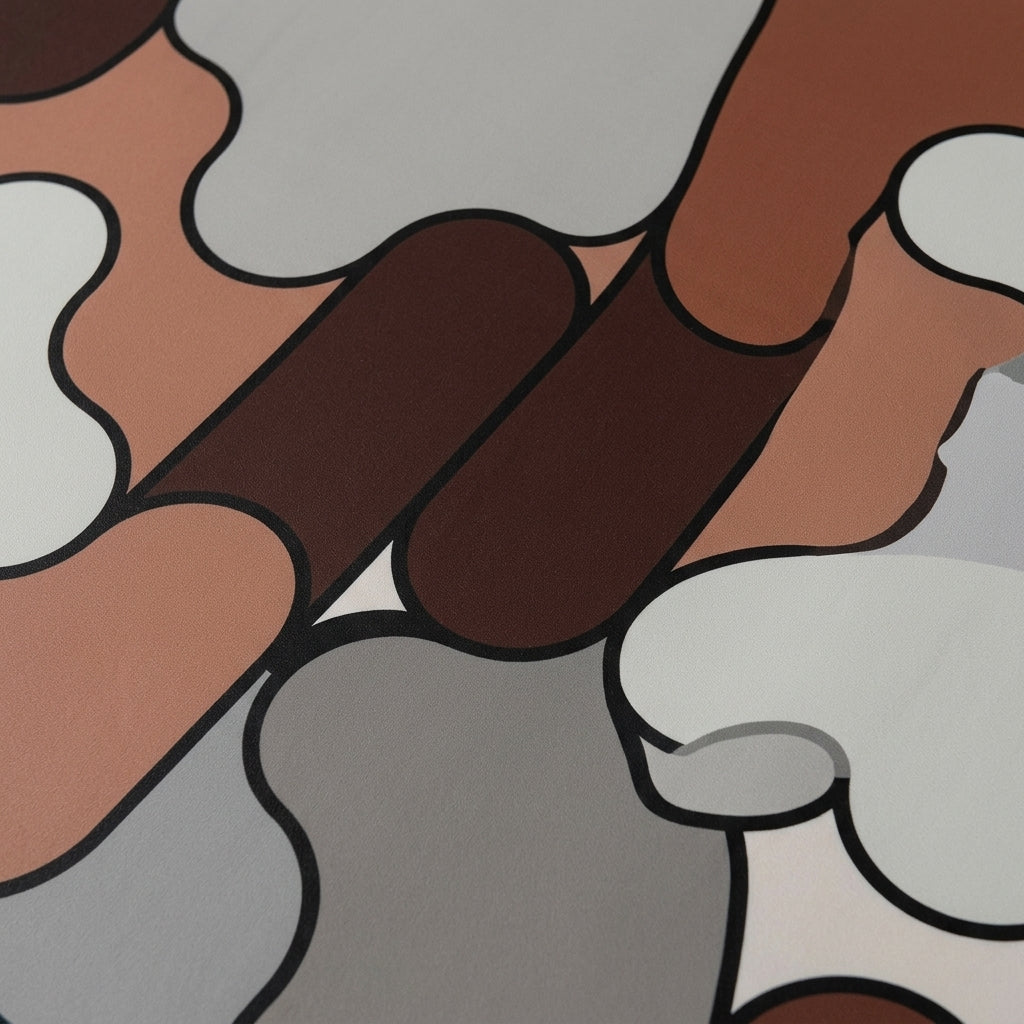 Close-up abstract bath mat pattern with brown, white, and black irregular shapes