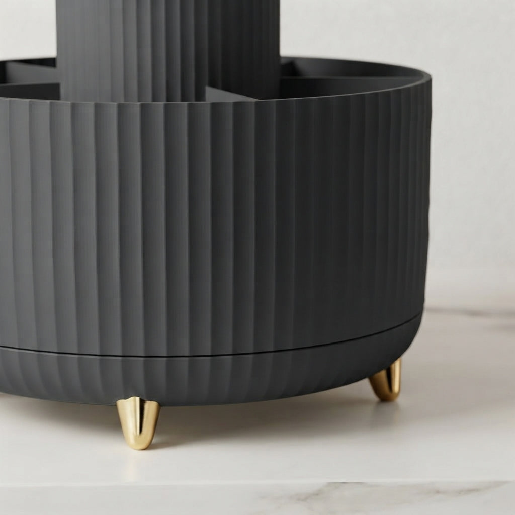 Black ribbed 360 rotating makeup organizer with gold feet and central stand