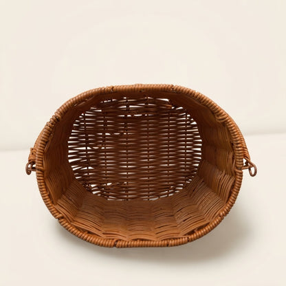 Open faux rattan picnic basket with arched handle, showing lined interior