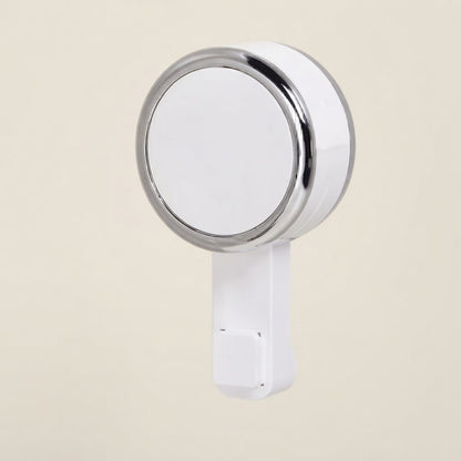 Grey suction cup shower caddy mount with round holder and protective base, close-up.