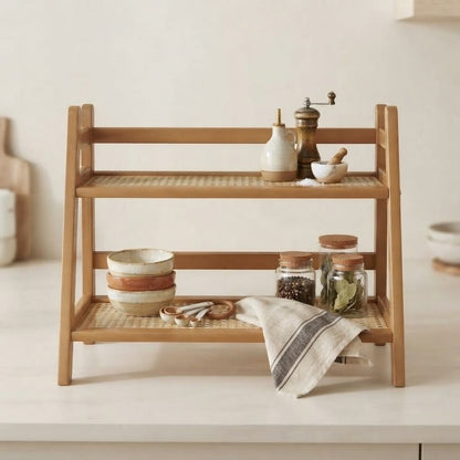 2-tier bamboo countertop rack displaying jars, cups, and pantry items