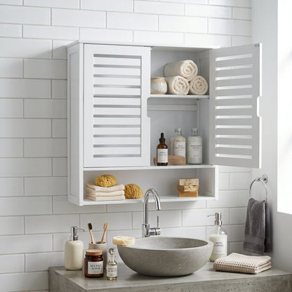 White bamboo wall cabinet open with shelves holding towels, soap, and bottles