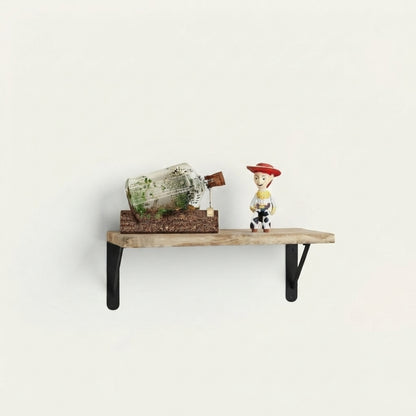 Ostenwood rustic wall shelf with black metal brackets and small figurines on top