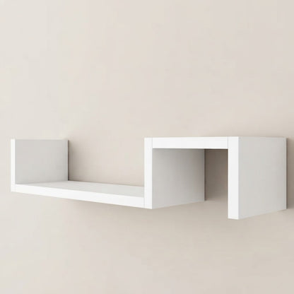 White wooden geometric wall shelf with open cubby sections