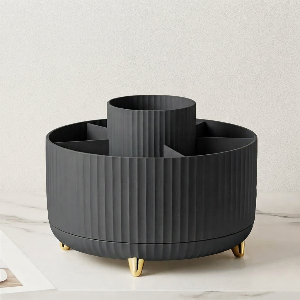 Dark gray ribbed 360 rotating makeup organizer with gold feet and central dividers