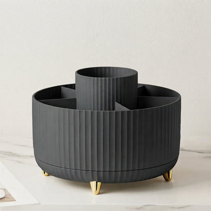 Dark gray ribbed 360 rotating makeup organizer with gold feet and central dividers