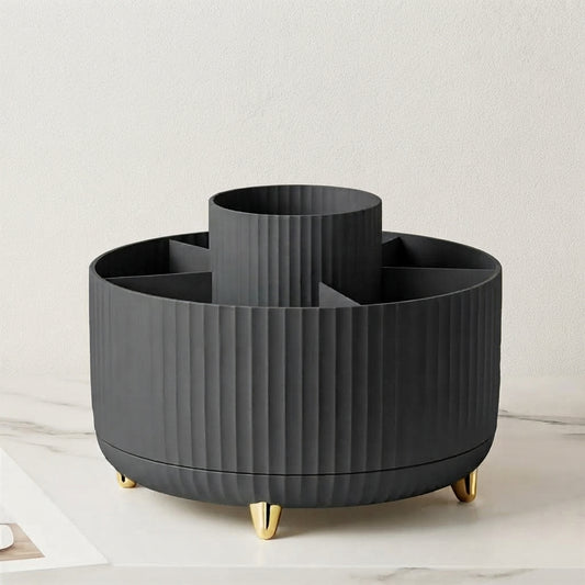 Dark gray ribbed 360 rotating makeup organizer with gold feet and central dividers