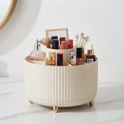 Ivory ribbed 360 rotating makeup organizer with gold feet and vanity cosmetics