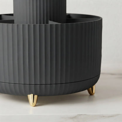 Black ribbed 360 rotating makeup organizer with gold feet and central stand