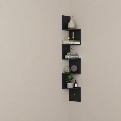 Black corner floating wall shelf with stacked open cubbies and small side flaps