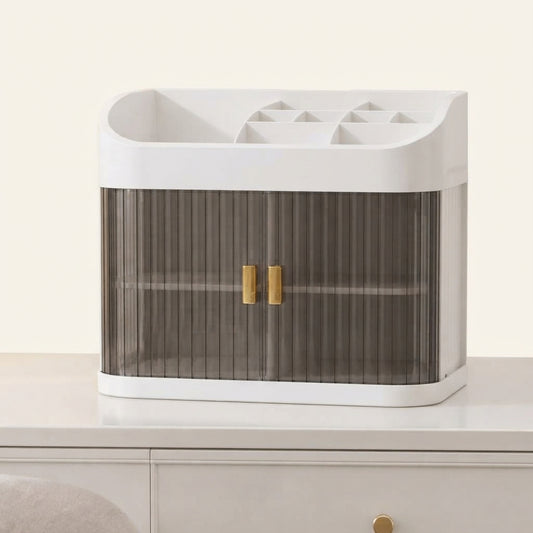 Countertop makeup organizer with white top and gray ribbed sides, single tier