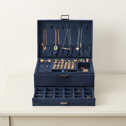 Dark blue velvet 2-tier jewellery box open with necklace slots and ring tray