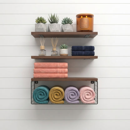 Floating wood shelf set with stacked tiers, black wire basket, rolled towels