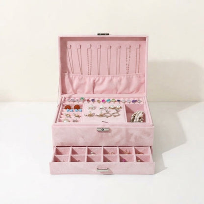 Pink velvet 2-tier jewellery box open with necklace slots and ring organizer