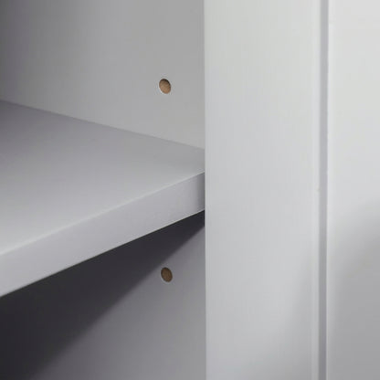 Under-sink bathroom cabinet interior with fixed shelves and two round wall-mount holes