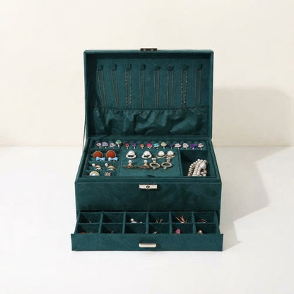 Green velvet 2-tier jewellery box open with necklace slots and divided drawers