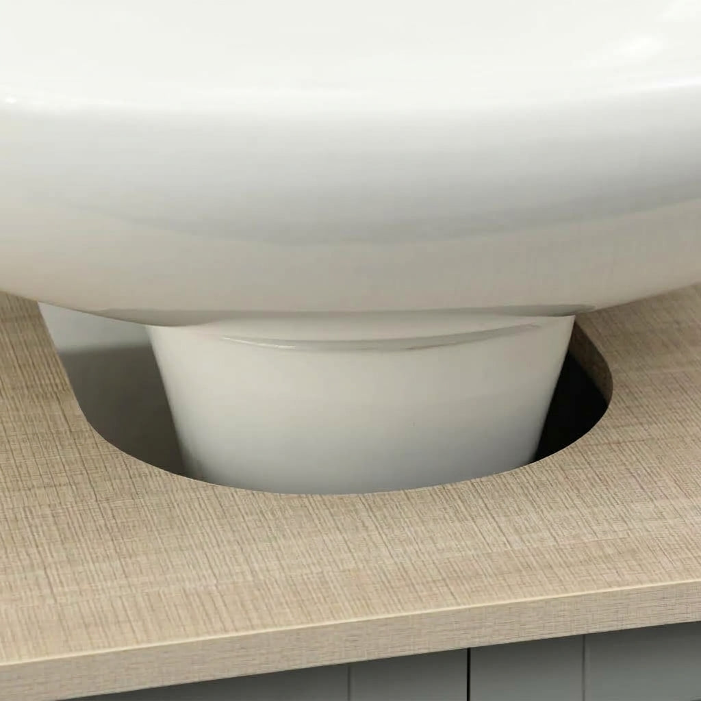 Under-sink bathroom cabinet base with curved access cutout and open interior space