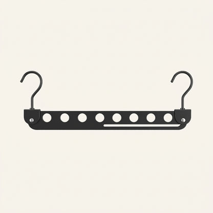 Black 8-slot foldable clothes hanger with eight light oval slot accents and two hooks.