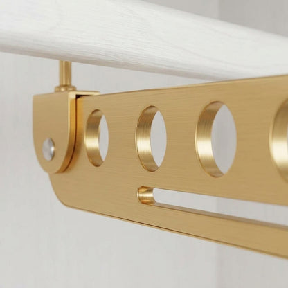 Gold 8-slot foldable clothes hanger with eight oval slots and metal hook ends.