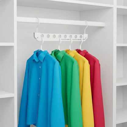 White 8-slot foldable clothes hanger holding shirts on eight hooks.