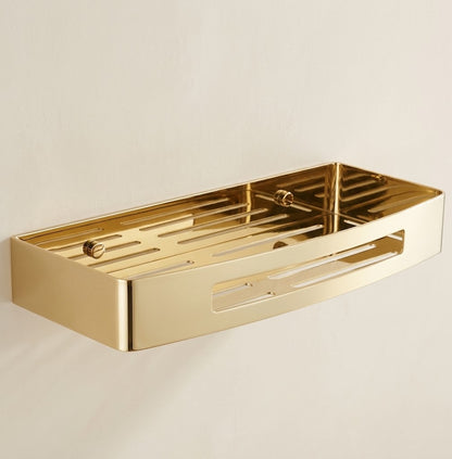 Gold stainless steel wall shower caddy tray with drainage slots, single tier.