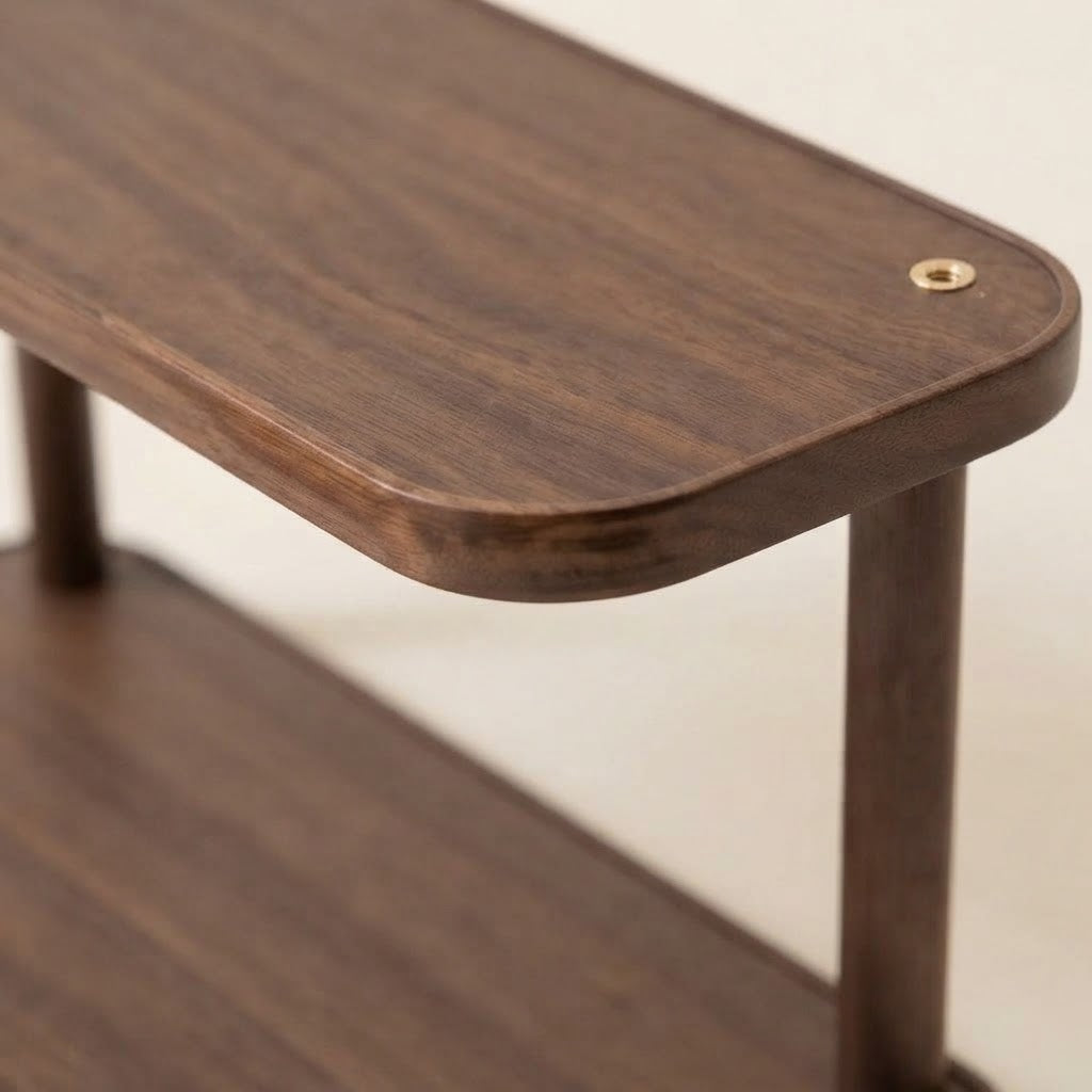 Close-up corner of two-tier bamboo rack with brass-toned grommet detail