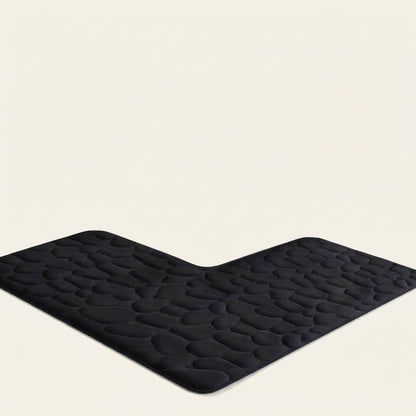 L-shaped non-slip bath mat with pebble embossing, black; V-corner view