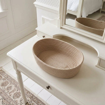 Oatmeal woven cotton rope oval storage basket with ribbed coil weave, open top