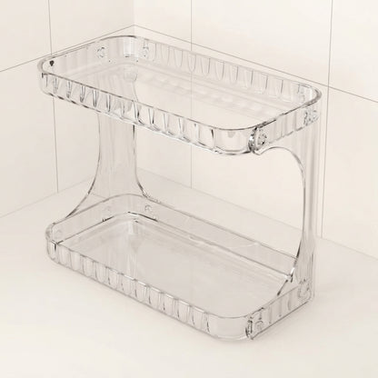 Clear acrylic bathroom countertop organiser with two shelves and side handle openings