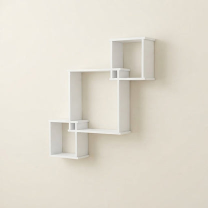 White wall-mounted cube shelf set with three levels of open compartments