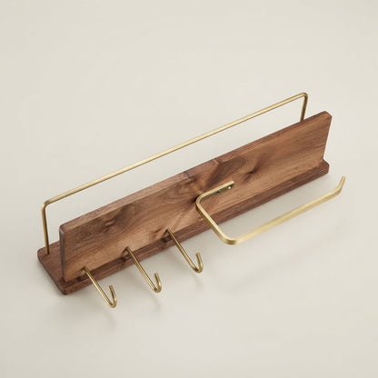 Brown solid wood floating shelf with gold-tone bar and four hanging hooks