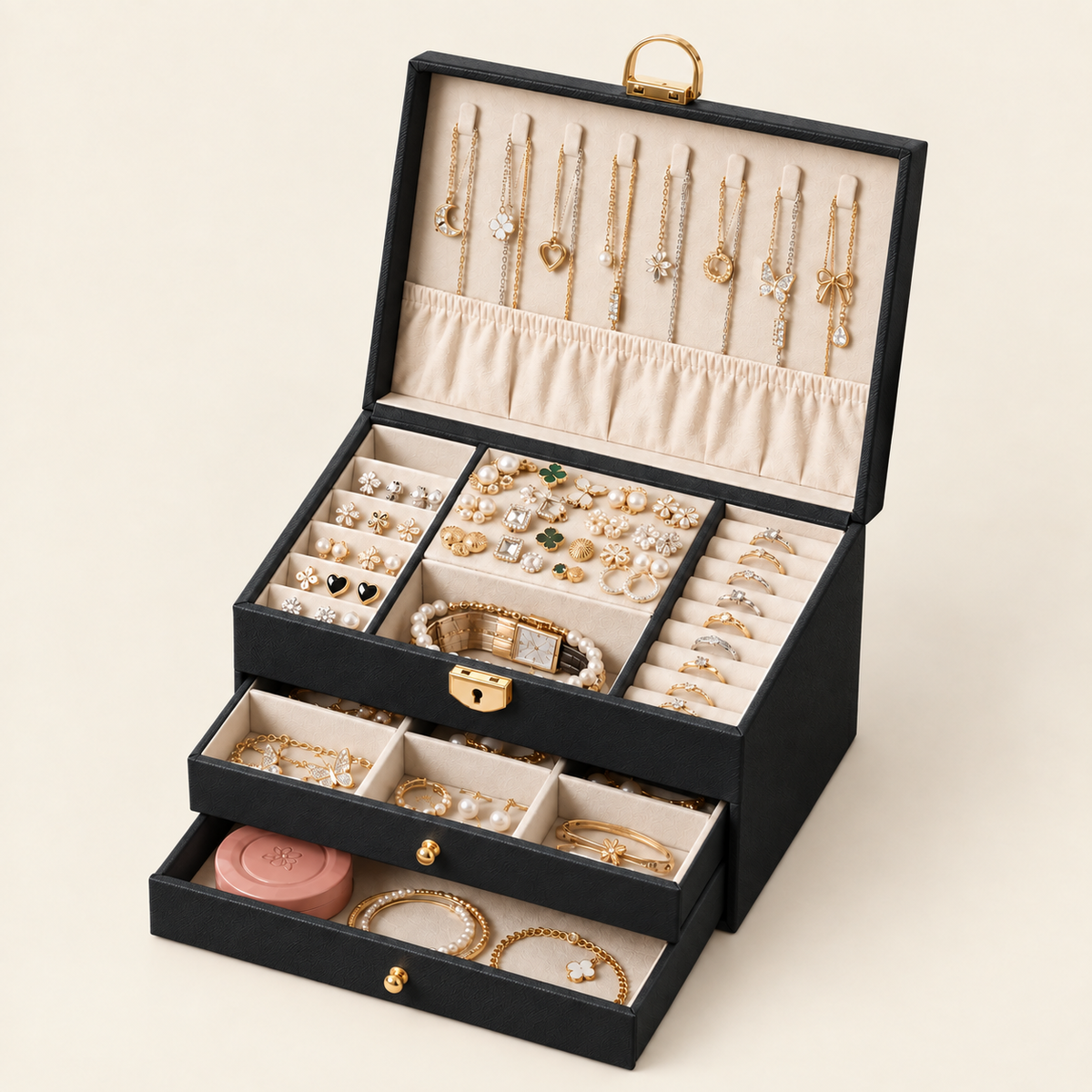 Black leather quilted jewelry box, open with divided drawers for rings and bracelets