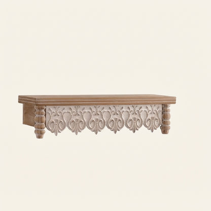Carved wooden floating wall shelf with scalloped floral carving under the top