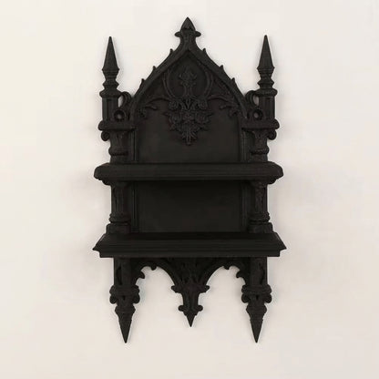Two-tier gothic wall shelf with arched crest and side spires, dark finish