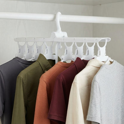 Multi-arm clothes hanger holding shirts in olive, rust, cream, and gray