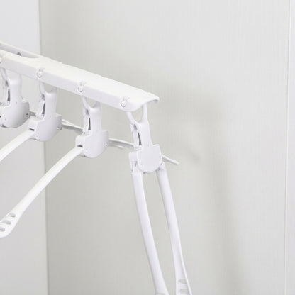 White folding arms of multi-arm clothes hanger with clip grips