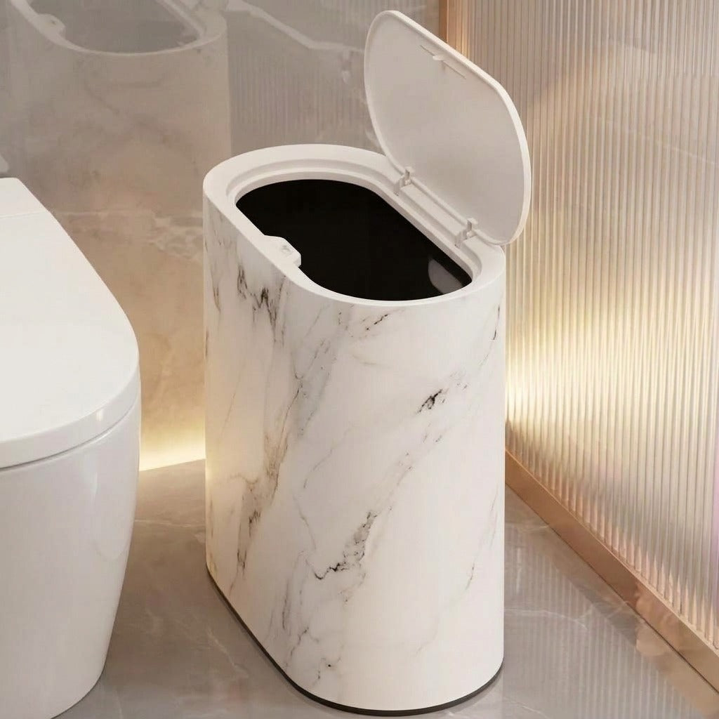 White marble bathroom bin with open oval pop-up lid