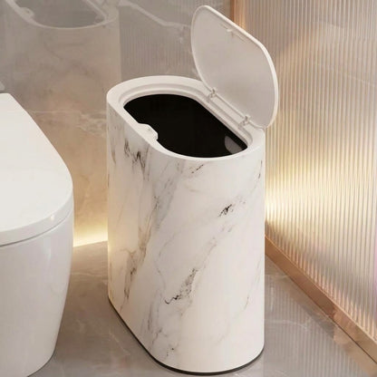 White marble bathroom bin with open oval pop-up lid