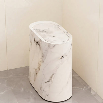 White marble bathroom bin with oval pop-up lid