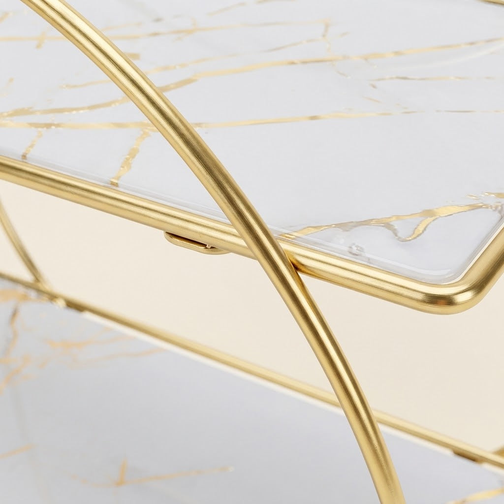 Close-up of gold-framed 2-tier organizer with white marble-effect tray edges.