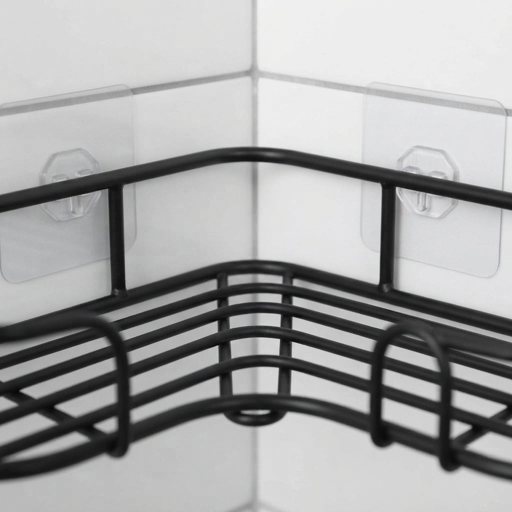 Black wire corner bathroom caddy with curved basket and adhesive mounting tabs