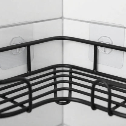 Black wire corner bathroom caddy with curved basket and adhesive mounting tabs