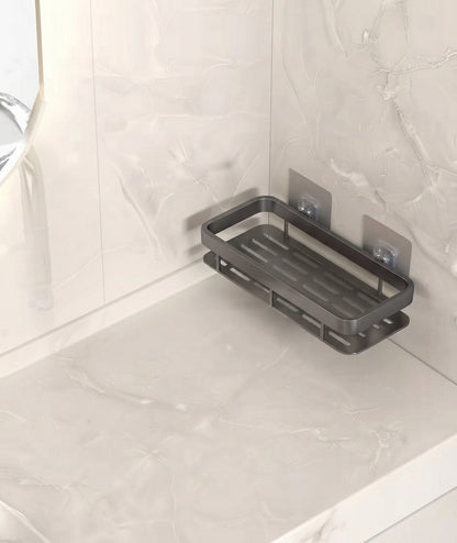 Charcoal grey two-tier slotted aluminum shower caddy, no-drill mount