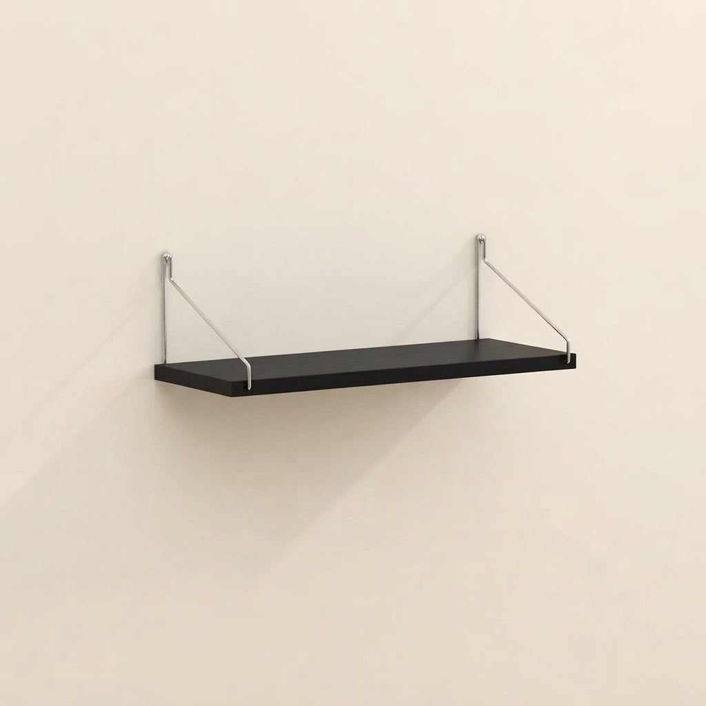 Bracket-mounted floating wall shelf with black shelf and clear metal supports