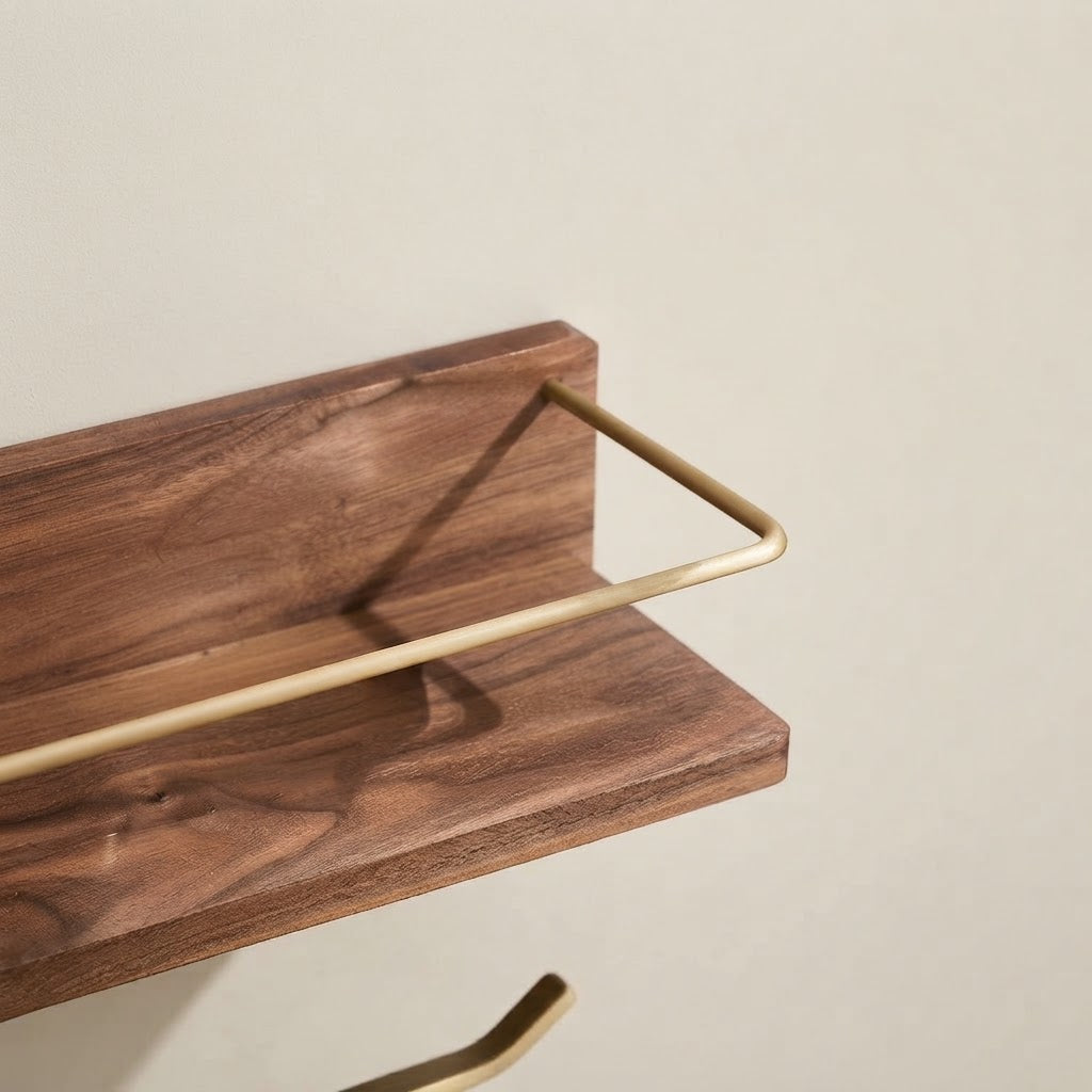 Brown solid wood floating shelf corner with gold-tone rail and smooth back edge