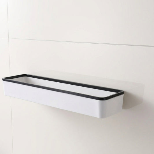 Wall-mounted bathroom storage shelf with white body and black rim, rectangular profile
