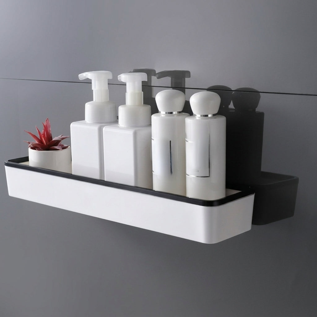 Wall-mounted bathroom storage shelf with white body and black trim, toiletries on top