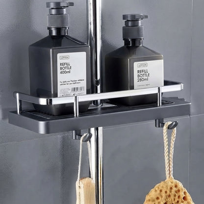 Dark gray shower riser rail caddy with two refill bottles and hanging loofahs