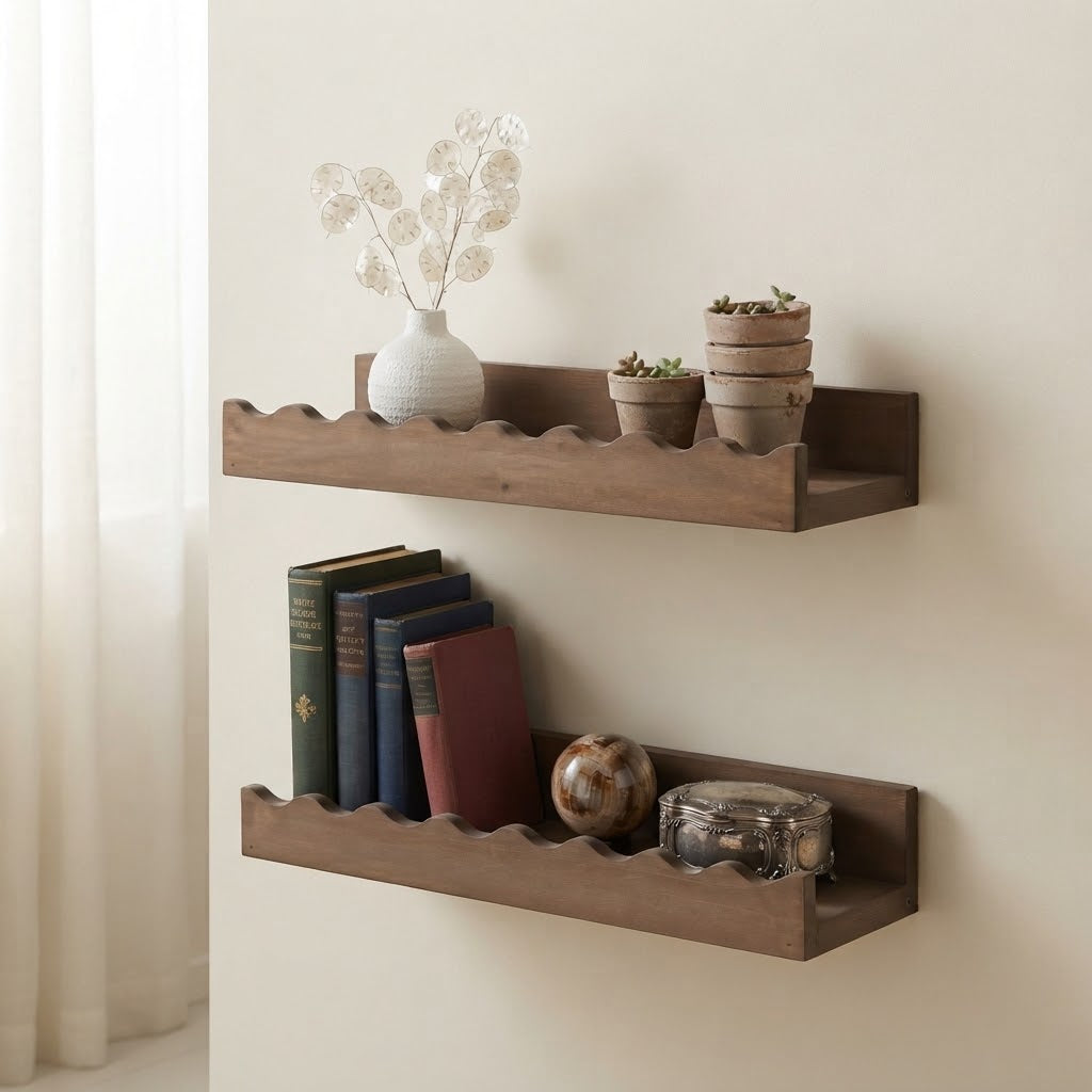 Walnut wooden floating wall shelf set with scalloped edges, styled with books and planters